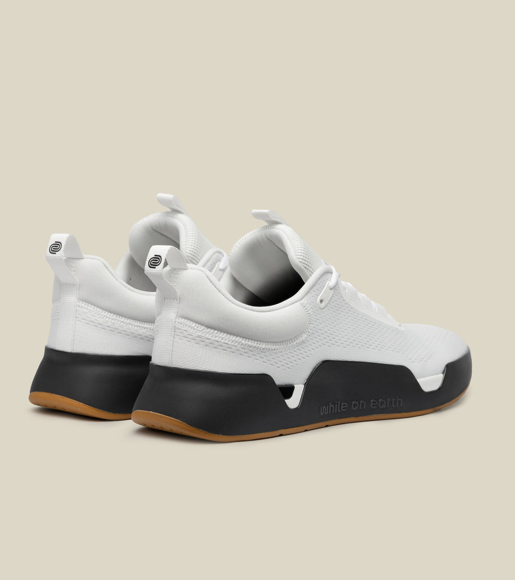 WHILE ON EARTH MOVE TRAINER | WHITE / BLACK GUM