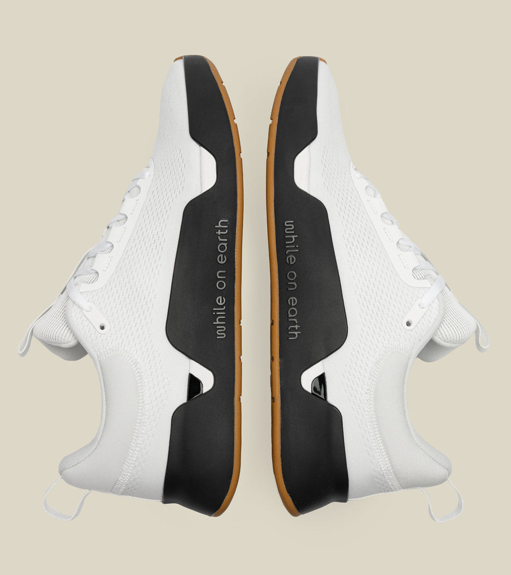 WHILE ON EARTH MOVE TRAINER | WHITE / BLACK GUM