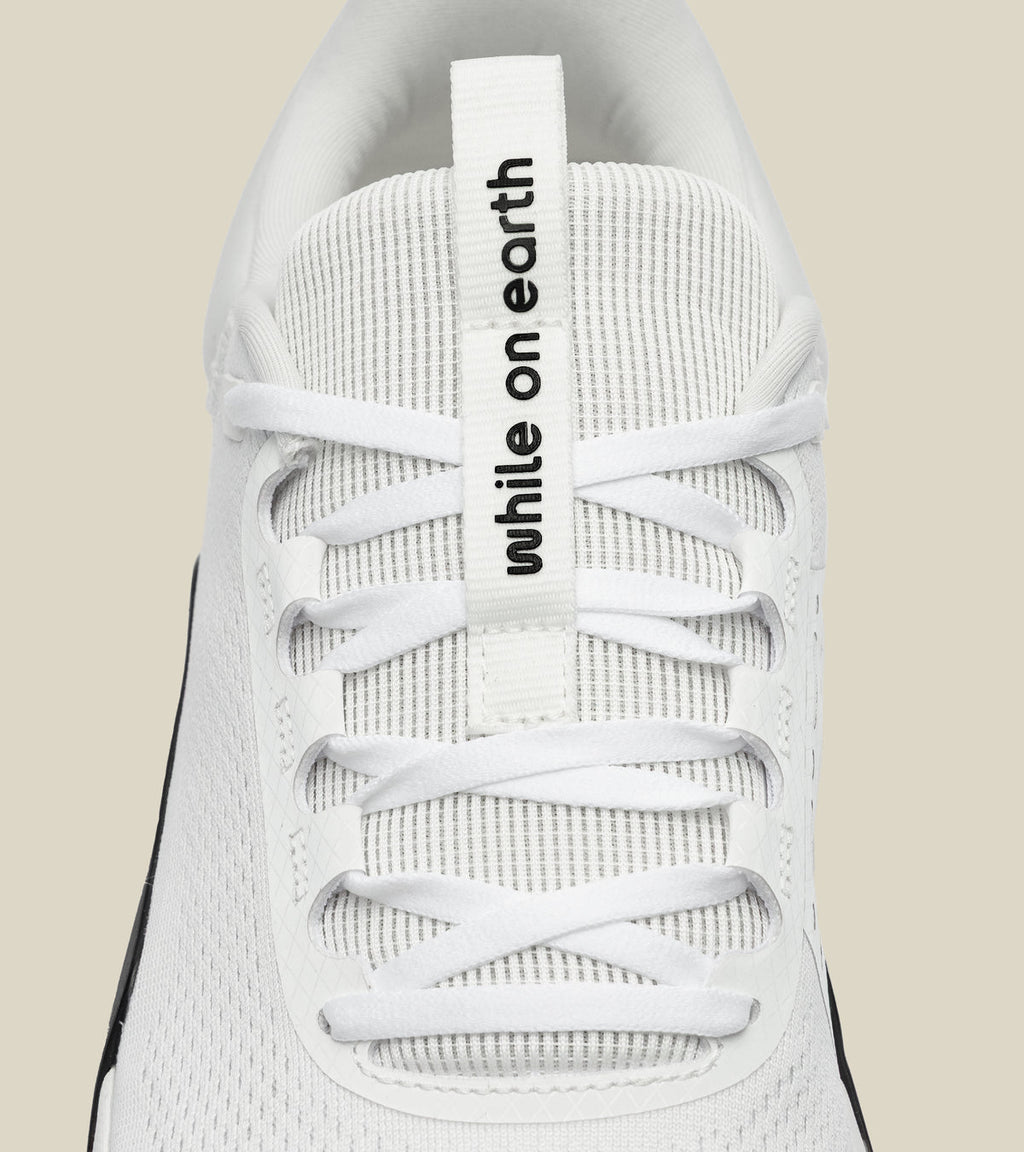 WHILE ON EARTH MOVE TRAINER | WHITE / BLACK GUM